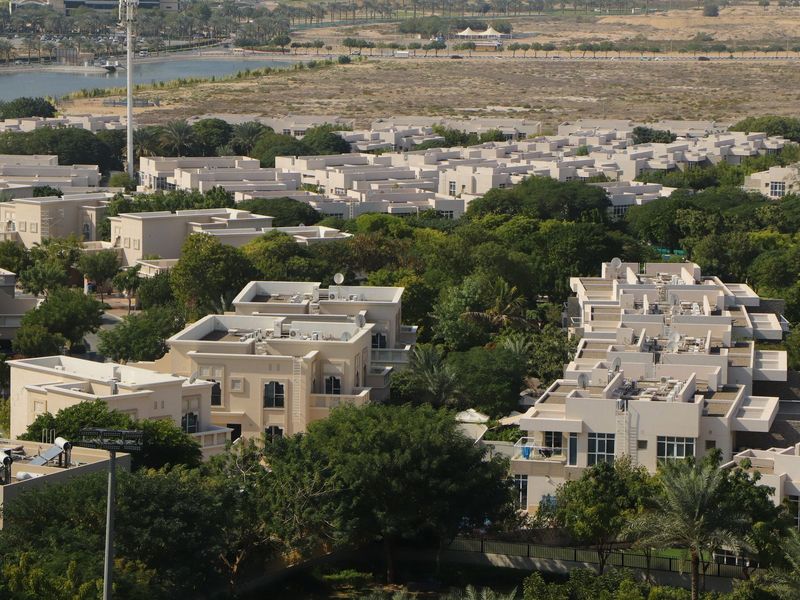 Aerial view of a green Dubai residential community